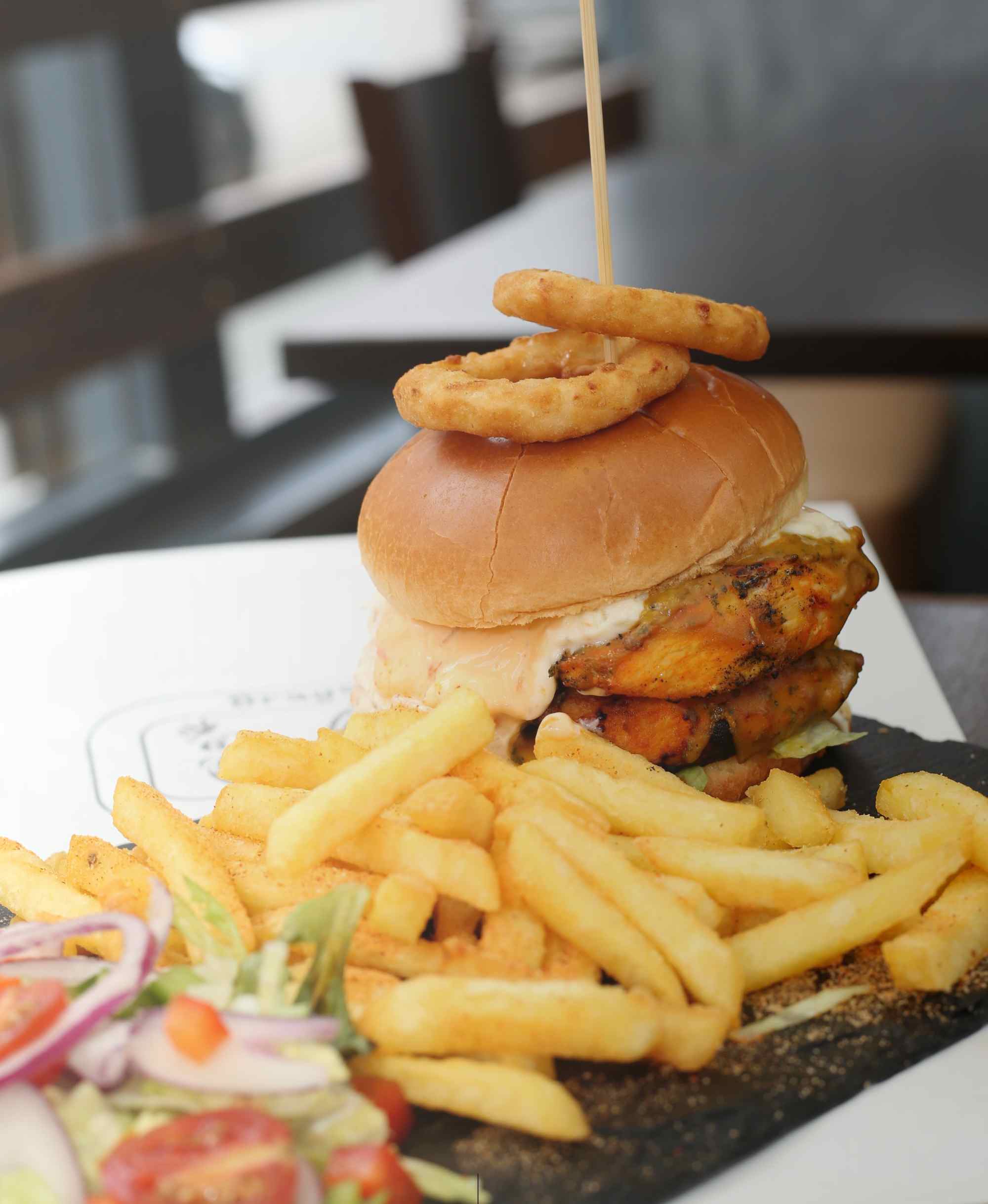 a juicy burger served at Braga’s Piri Piri takeaway in Glasgow
